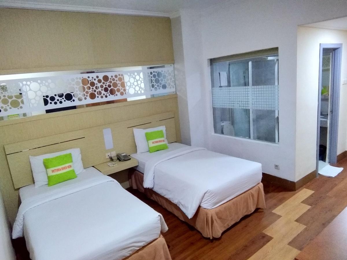 בנג'ארמאסין Hotel Victoria River View מראה חיצוני תמונה